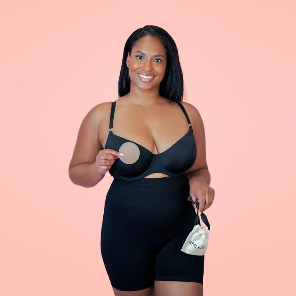 A model is showcasing chocolate-colored nipple covers, highlighting their size and shade.