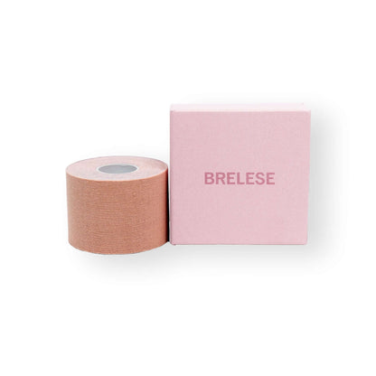 5 cm nude boob tape placed next to the pink box with the Brelese logo.