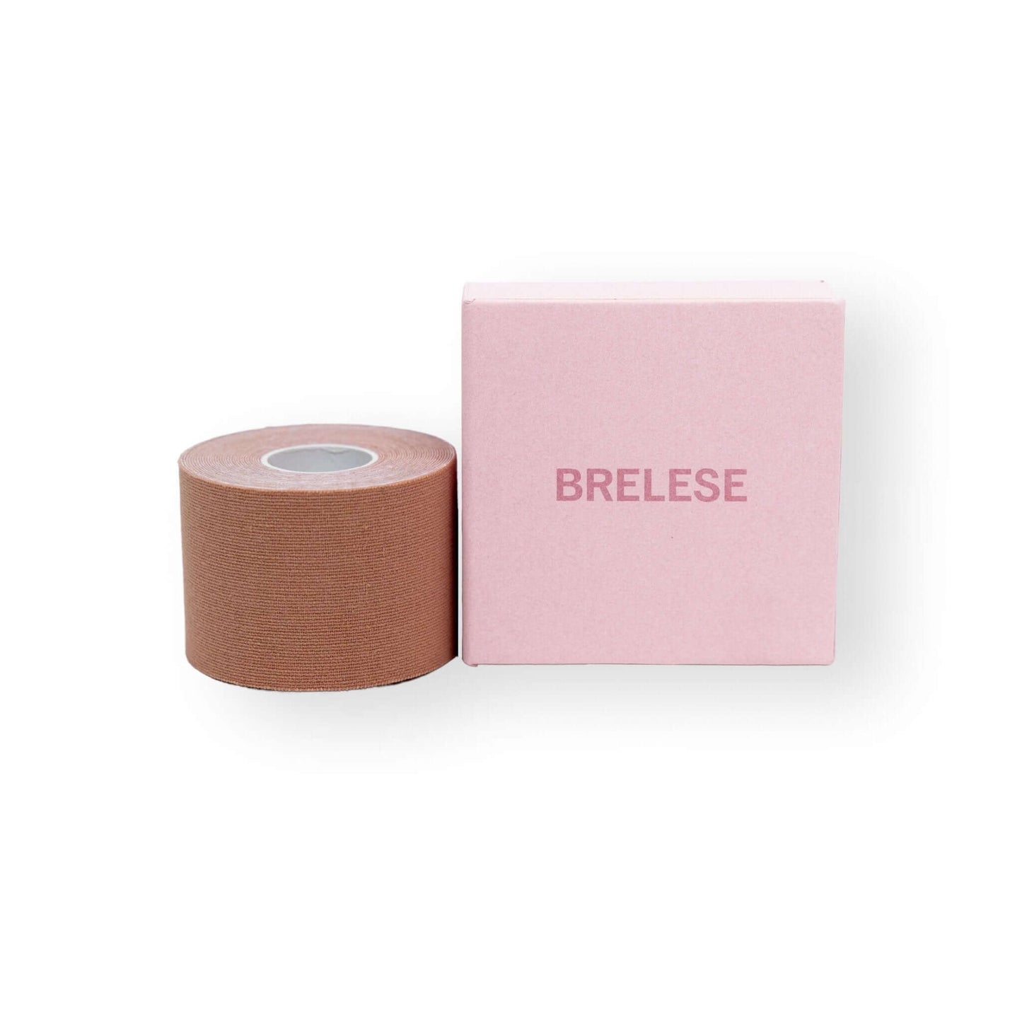 Chocolate 5cm boob tape placed next to the pink box with the Brelese logo.