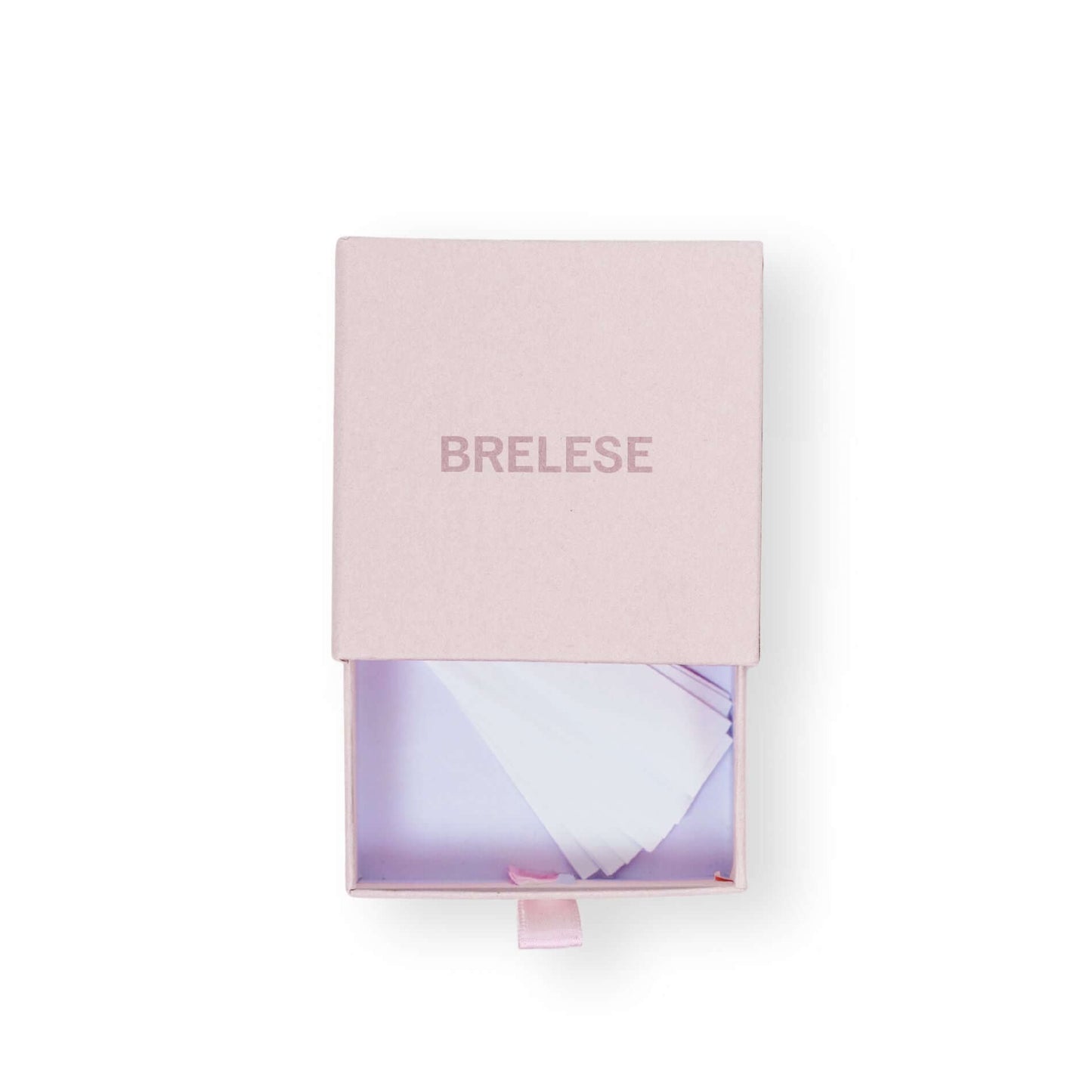 Clothing and fashion tape packaged in a pink box featuring the Brelese logo.